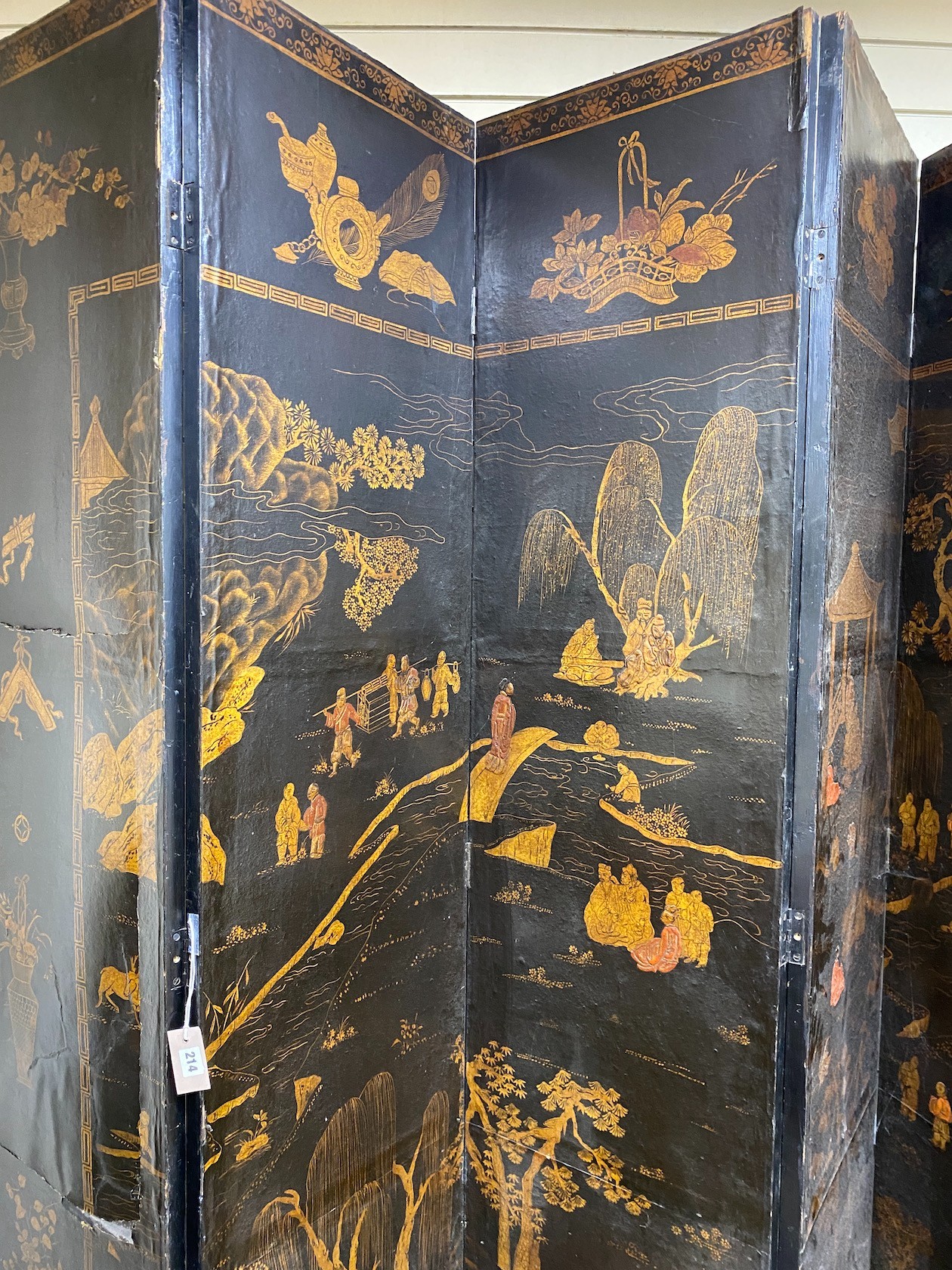 A Chinese chinoiserie lacquered six fold screen, panel width 46cm, height 237cm